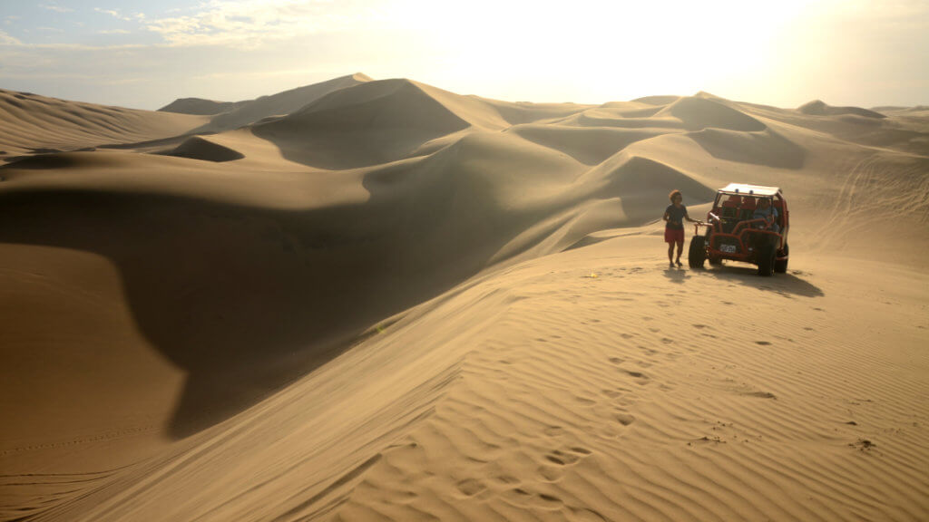 Dune buggy in sand dunes