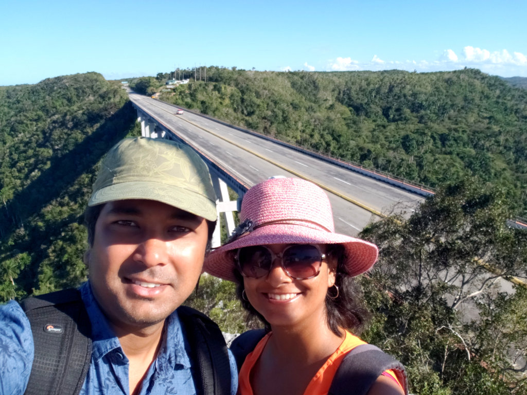 Us at the view point, the Bacunayagua bridge in the background