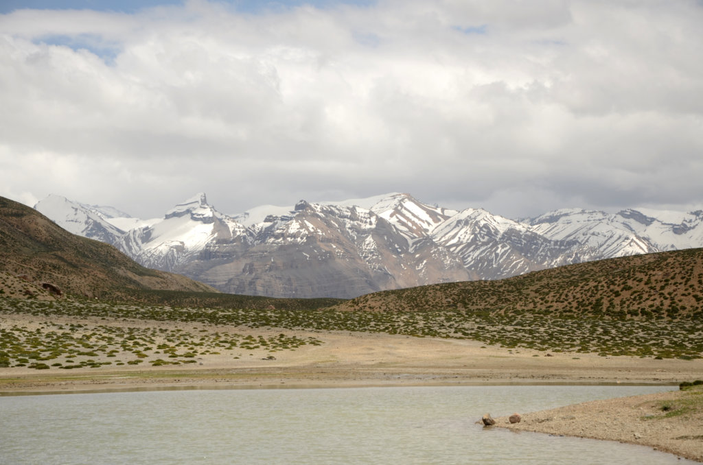 Dhankar lake, with a view of snow-capped Himalayan mountains. Spiti valley.