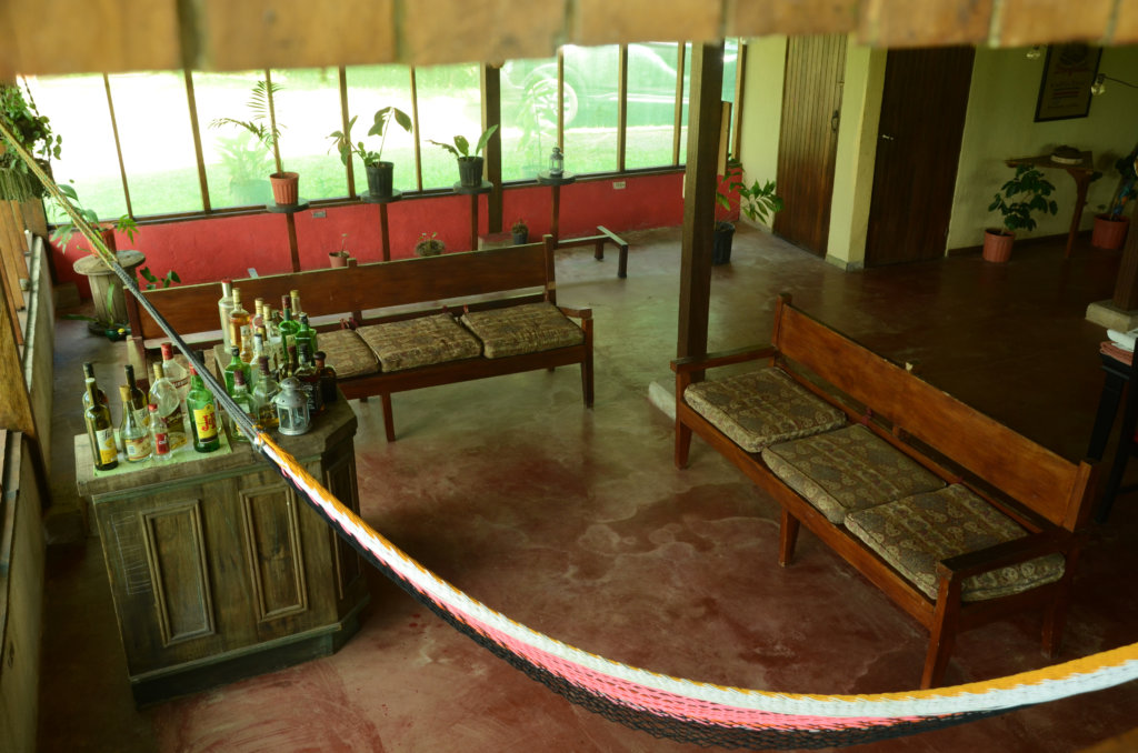 A bar and a hammock, at Hostel Casa Sarapiqui
