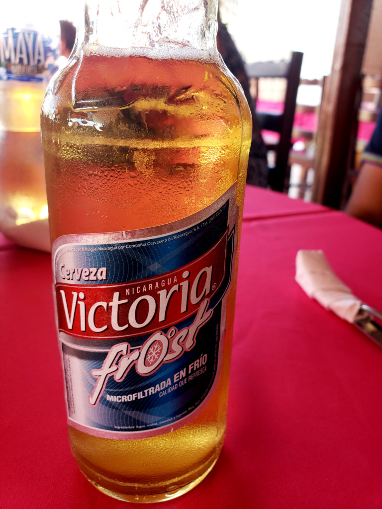 Victoria Frost Beer at Masaya - trying the cerveza nacional during the Nicaragua day trip