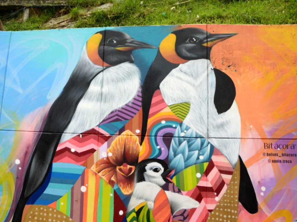 Comuna 13 graffiti with penguins