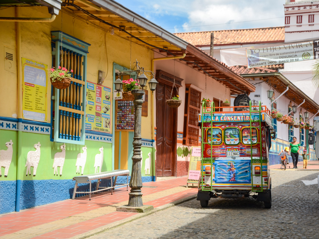 Colorful tuktuk on the colorful streets of Guatape.