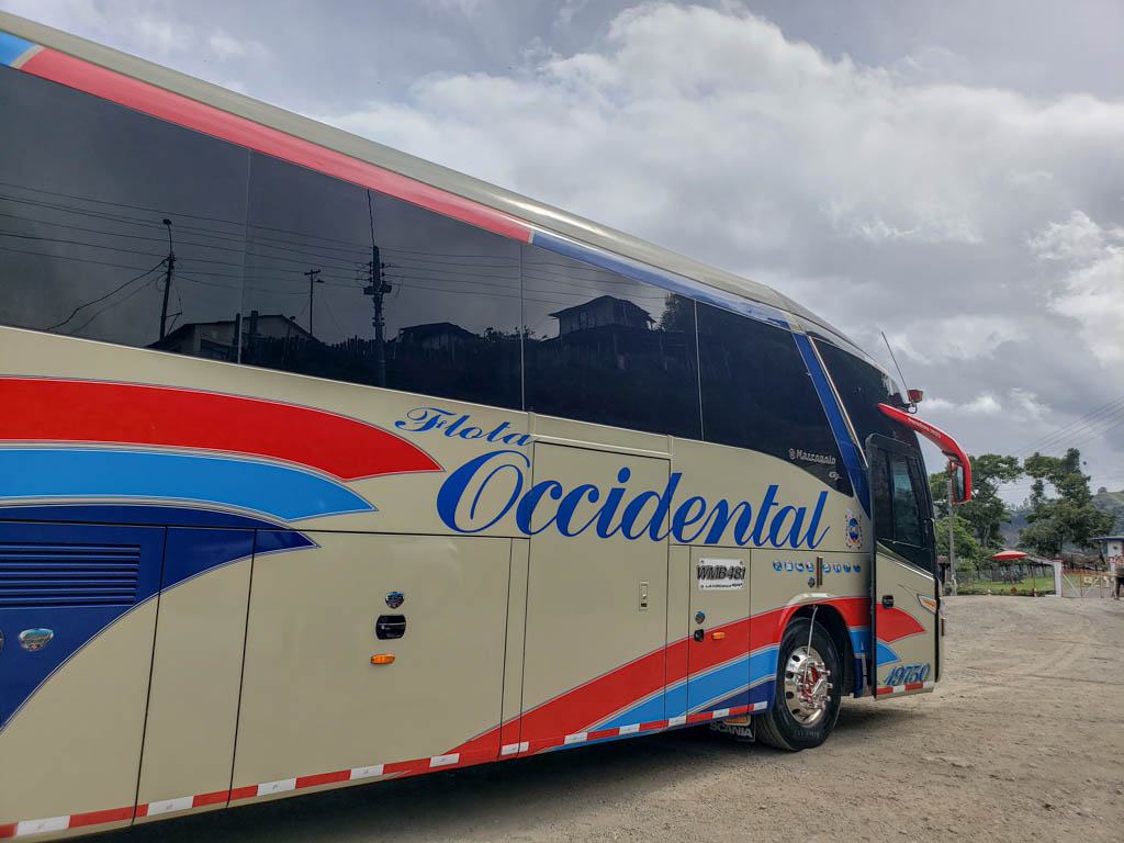 The side view of Flota Occidental bus at Salento bus station. Flota Occidental is the only bus service provider offering direct bus from Salento to Medellin.