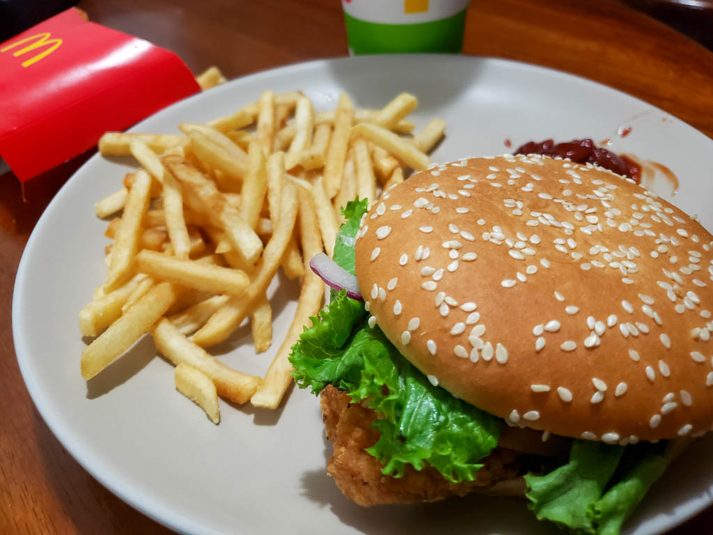 McDonald's crispy chicken burger, french fries with tomato sauce and a coke. This was the end of our 75 days of lacto-ovo vegetarian diet.