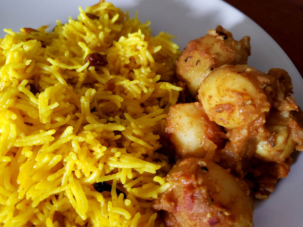 Basanti Pulao with Aloo-r Dom, a typical fancy vegetarian Bengali meal.