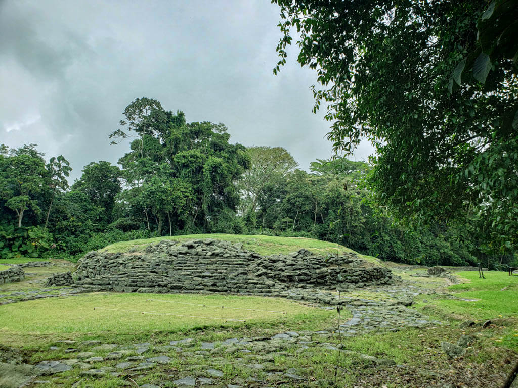 Central mound at Guayabo National Monument in Costa Rica. It is a circular elevated mound with stone base structure.