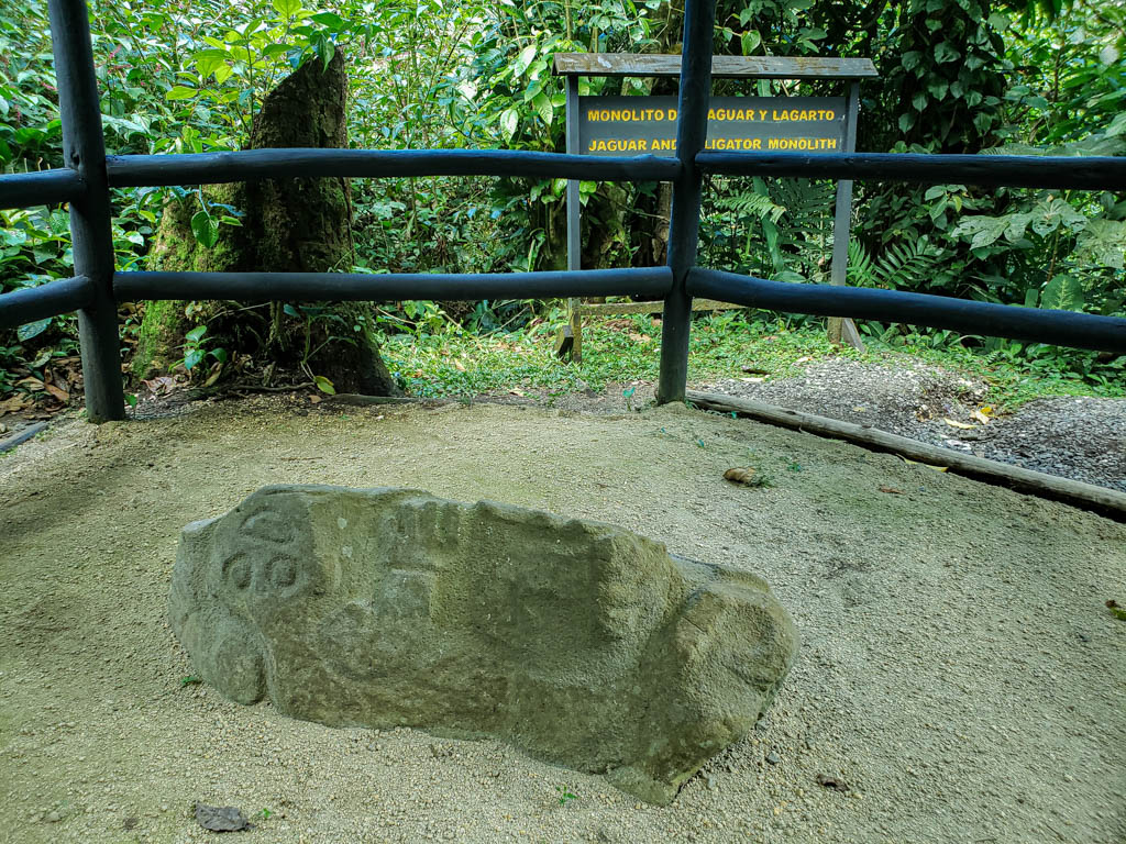 A monolithic rock with jaguar on one side and an alligator on the other. This is a petroglyph at Guayabo National Monument.