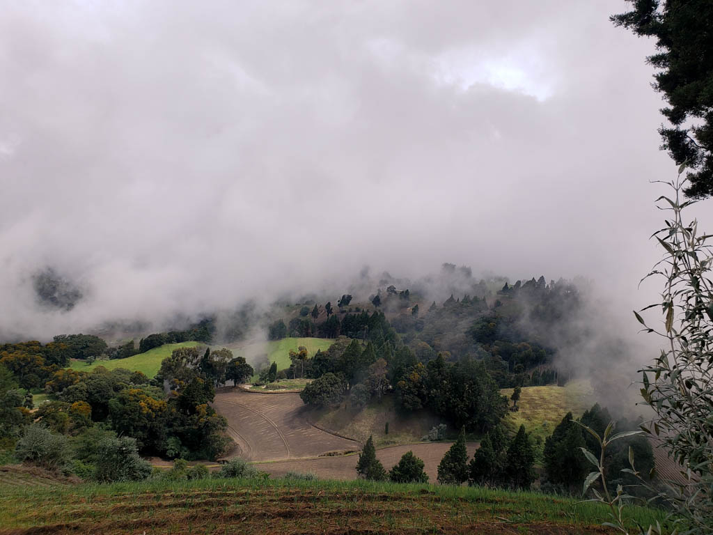 White clouds over green valley at Mirador, when you visit Sector Prusia.