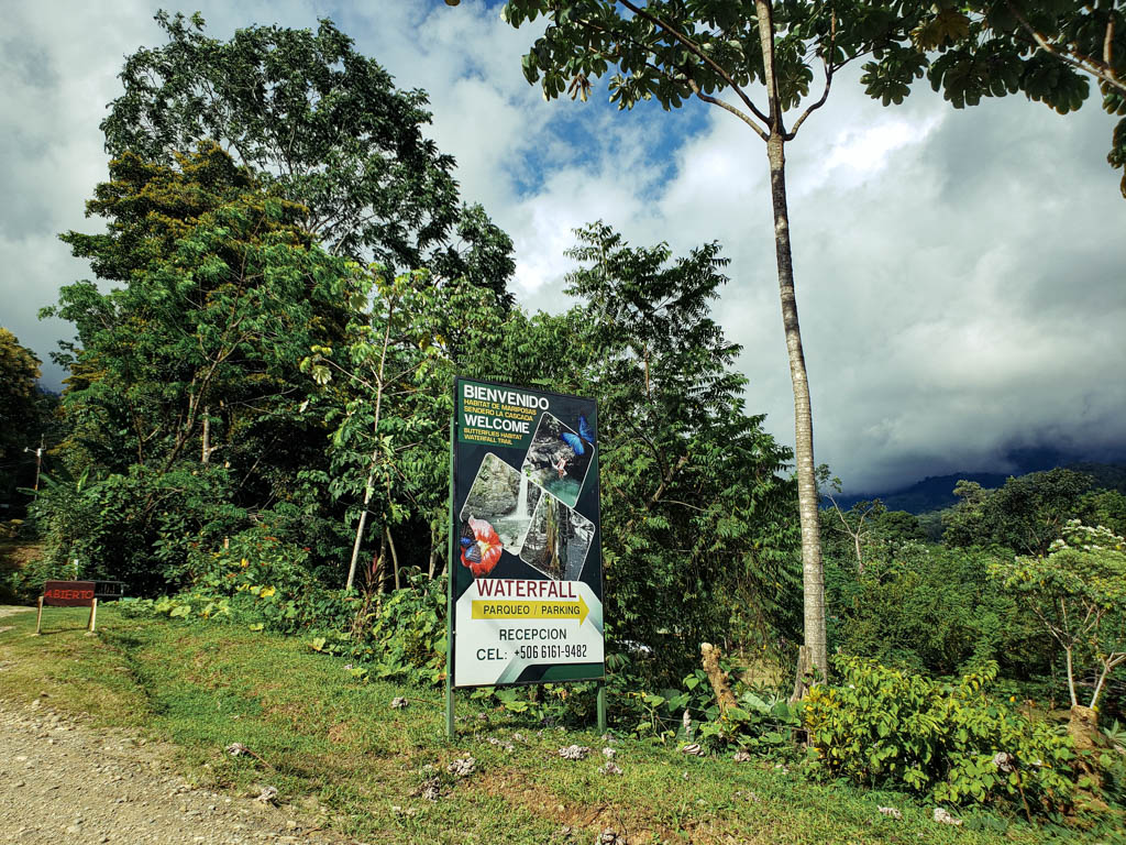 The Uvita Waterfall signboard just before the entrance to the property