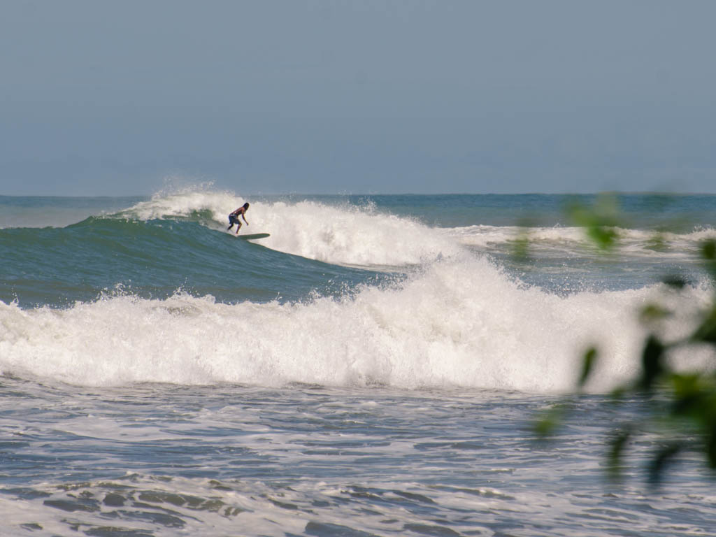 A surfer riding a big wave.