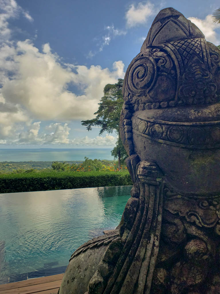 Javanese statue by the infinity pool