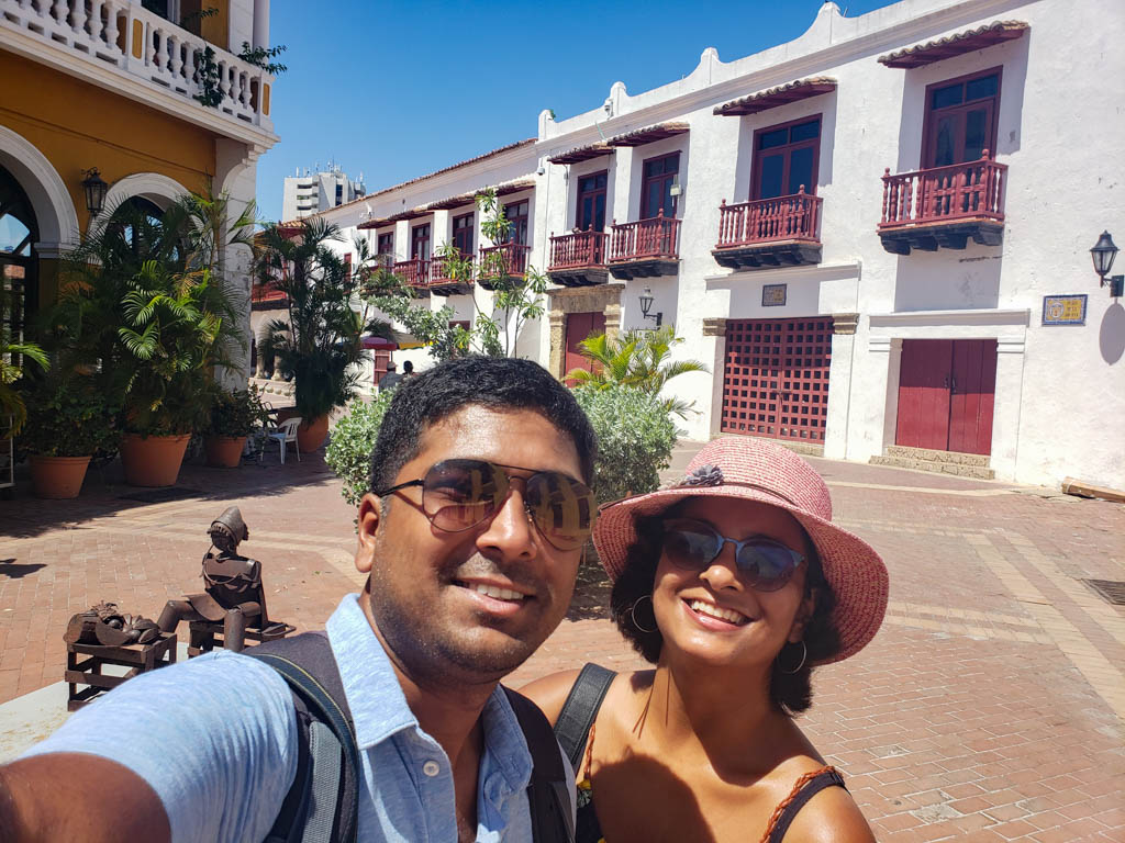 Paradise Catchers, smiling at the camera, taking selfie at Plaza San Pedro Claver.