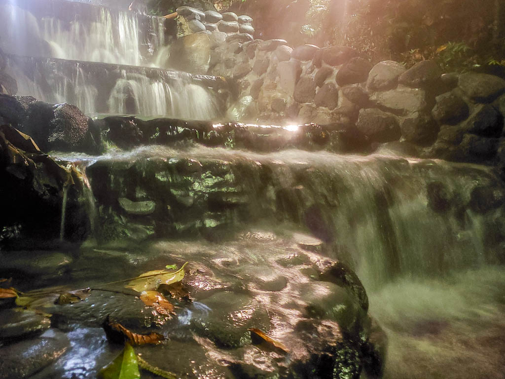 The waterfall of volcanic hot springs on stones