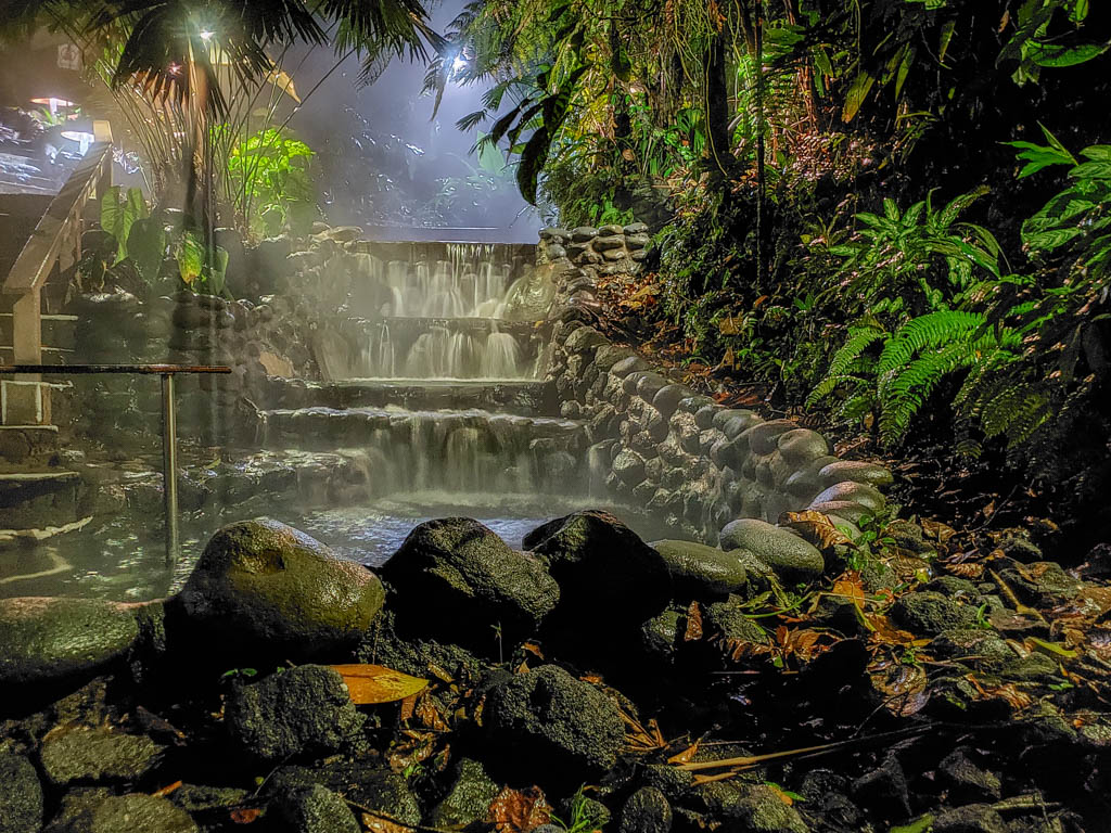 Waterfall flowing over stones in Ecotermales Hot Springs, La Fortuna, Costa Rica