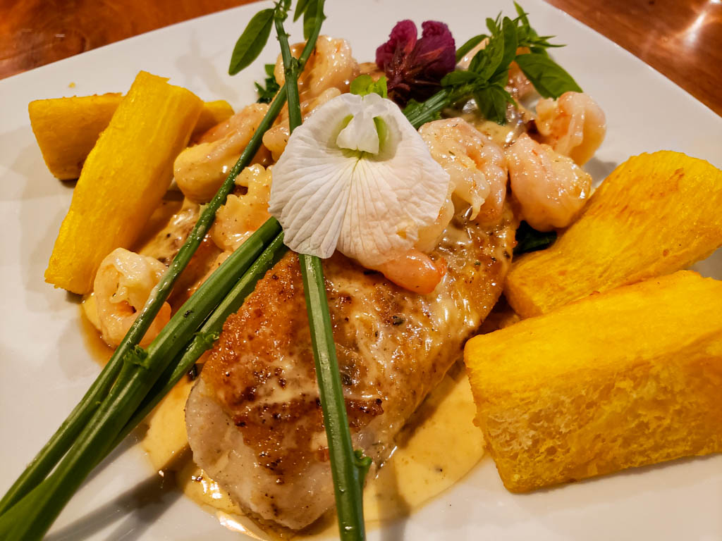 Tilapia encrusted with Yucca in Shrimp Sauce.
