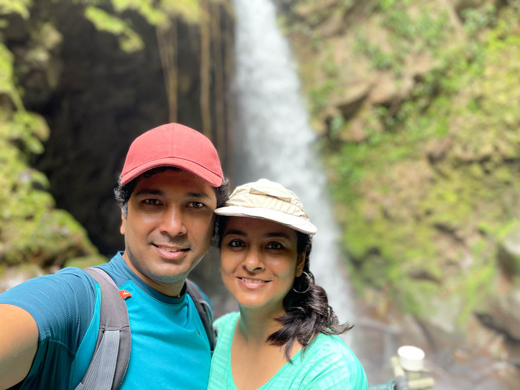 Selfie of a couple in front of Oropendola waterfall in Guanacaste, Costa Rica.