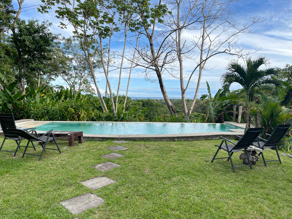 Swimming pool overlooking the ocean at Wild Sun Jungle Lodge in Cabuya, Costa Rica.