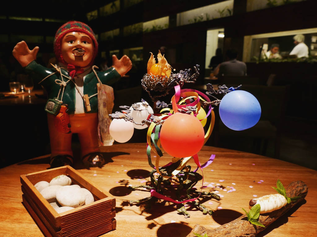 A decorated dining table at a fine dining restaurant in Lima.