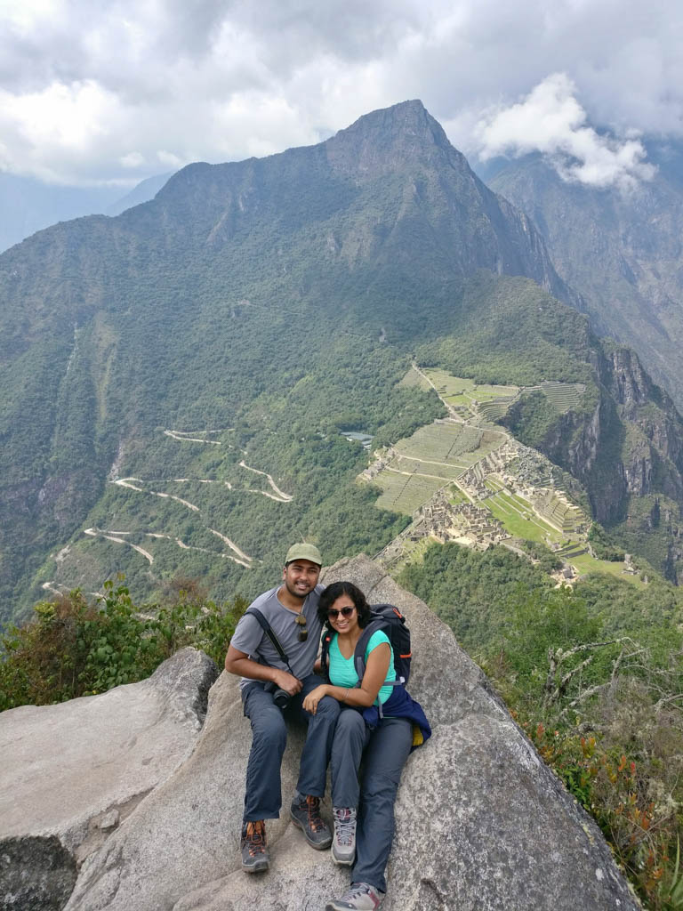 Paradise Catchers, at the top of Huayana Picchu mountain. Machu Picchu in the background.