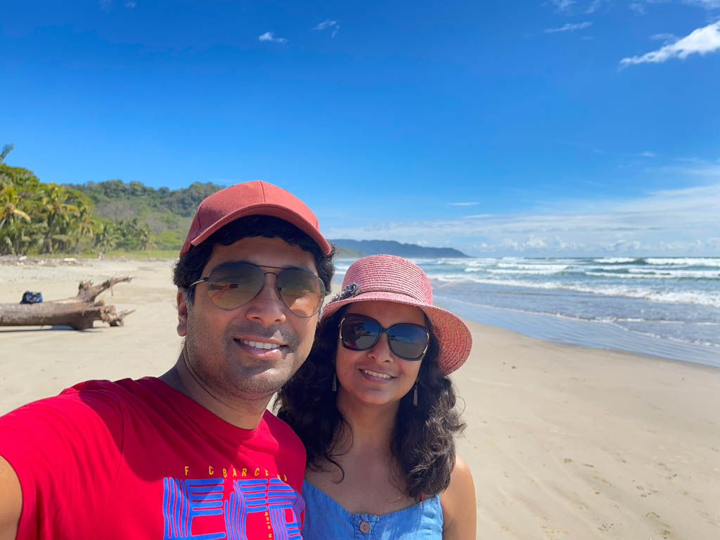 Paradise Catchers posing for a selfie at the beach by Pacific Ocean.