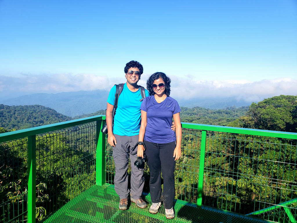 A man and a woman on the observation tower of the Youth Challenge trail.