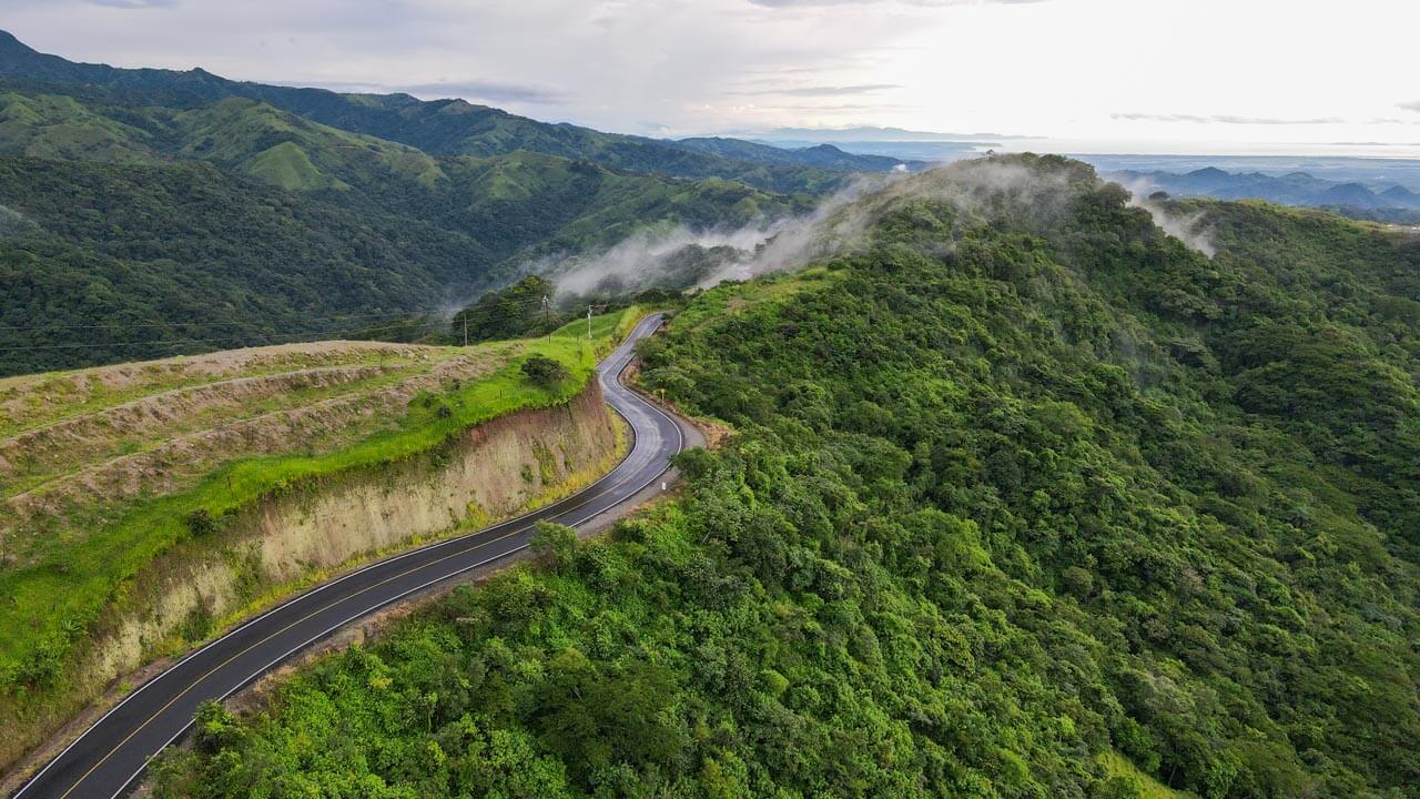 An aerial shot of the Route 606 that connects to Monteverde. Green mountains landscape view of Costa Rica.