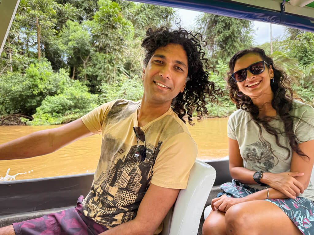 A man and a woman onboard the boat to Tortuguero. Boat is one of the ways how to get to Tortuguero.