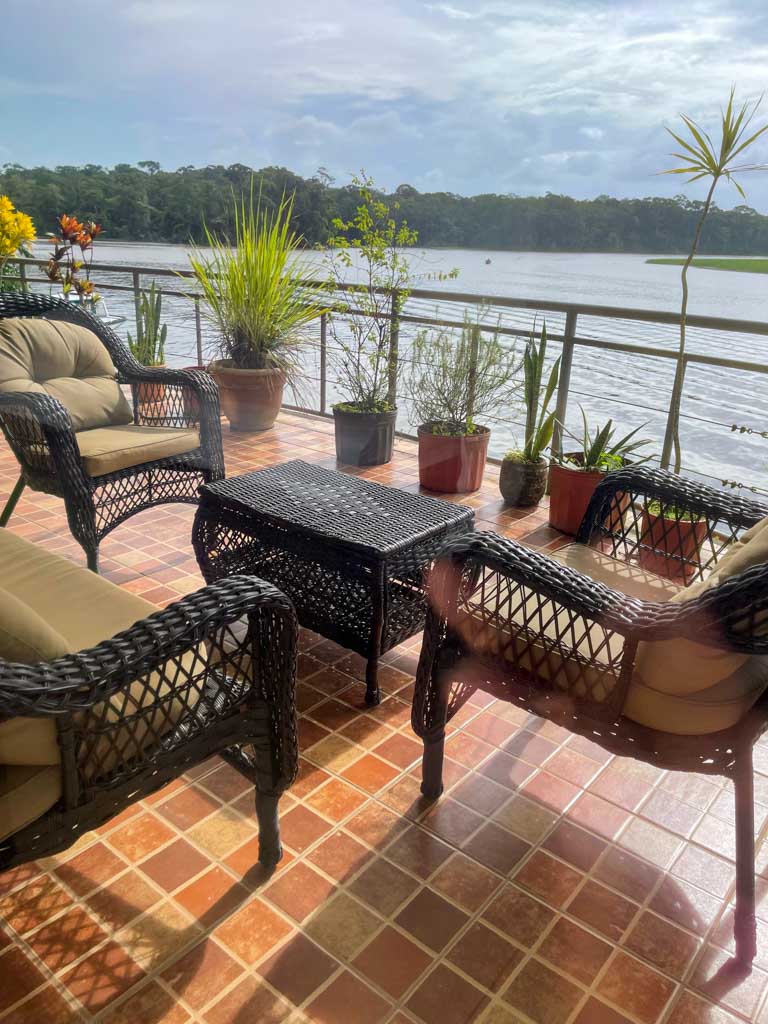 Balcony seating at a waterfront accommodation in Tortuguero, Costa Rica.