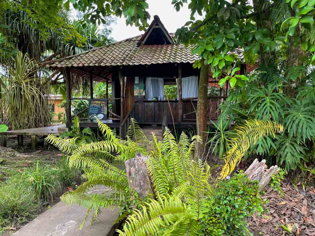 Caribbean jungle spa cottage surrounded by tropical gardens.