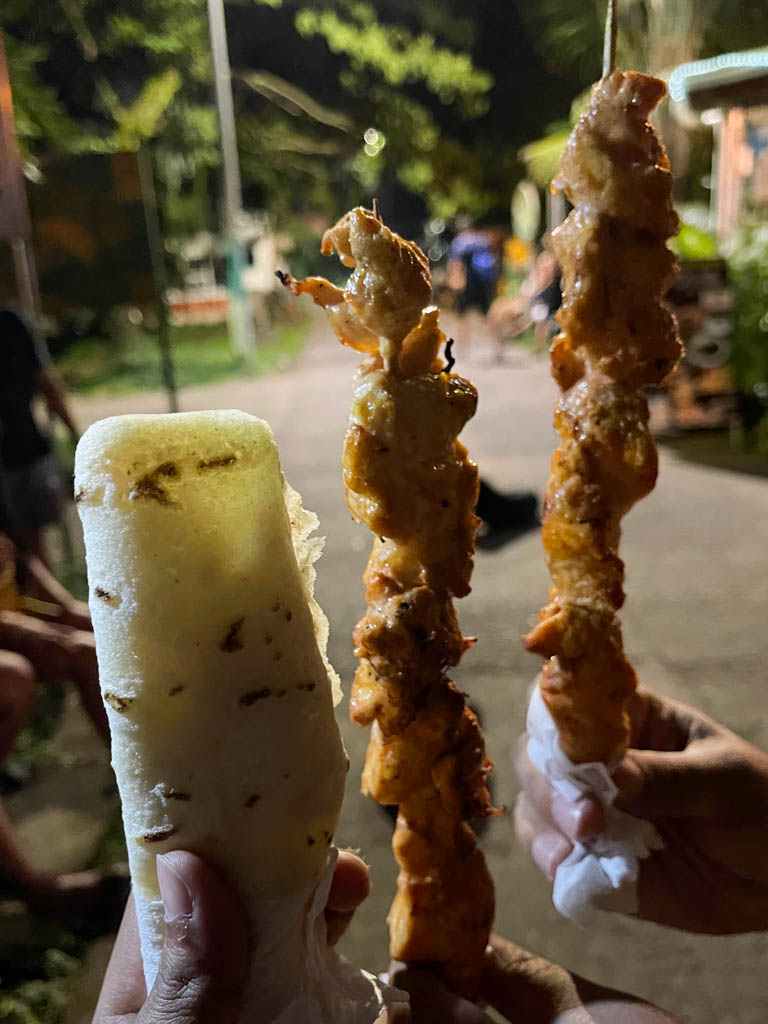 Tortillas con queso y crema, and pinchos de pollo - delicious street food in Tortuguero.