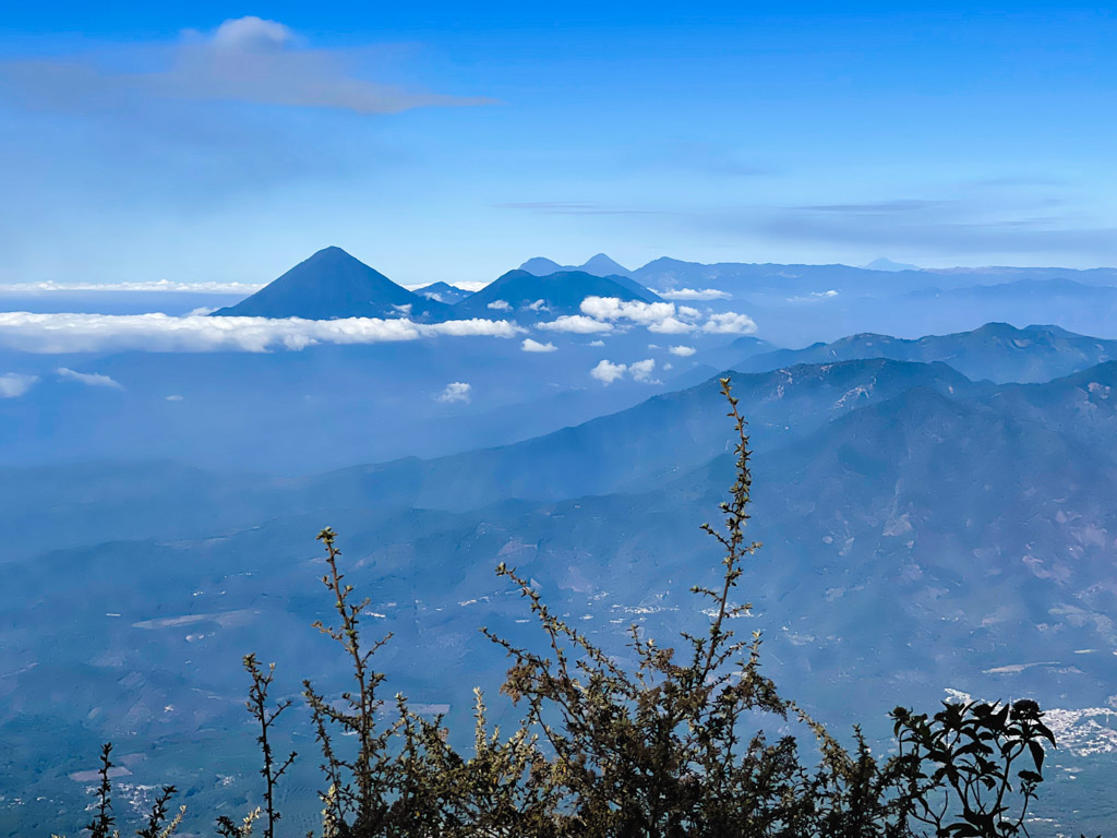 View from Acatenango volcano hike trail - seen in the horizon, other famous volcanoes of Guatemala: Atitlan, Toliman, San Pedro and Tajumulco.