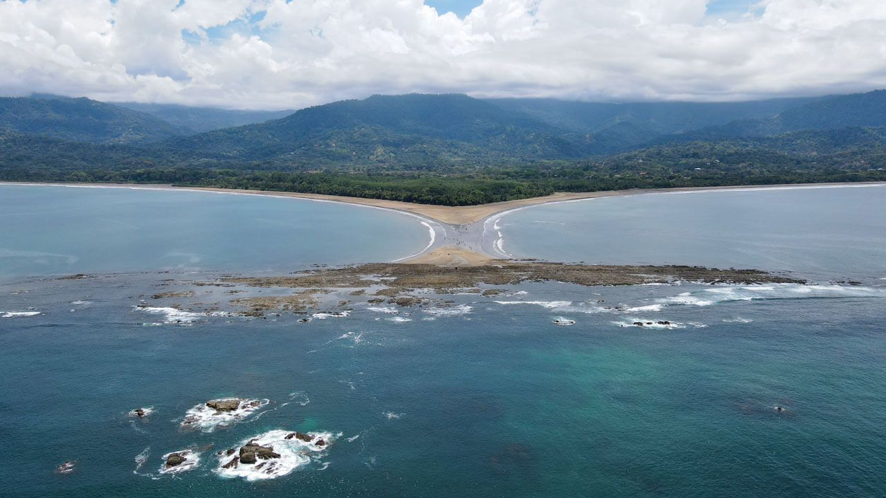 Aerial shot of Uvita beach with Whale's Tail formation