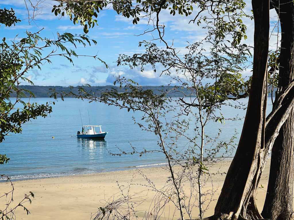 A calm morning at Playa Buena. Boat waiting for its day guests.