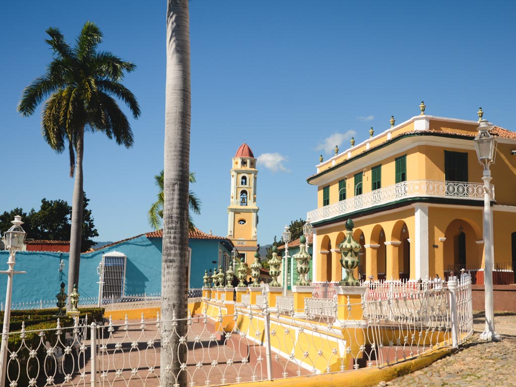 Colorful colonial architecture and cobblestone streets of Trinidad, one of the best places to visit in Cuba.