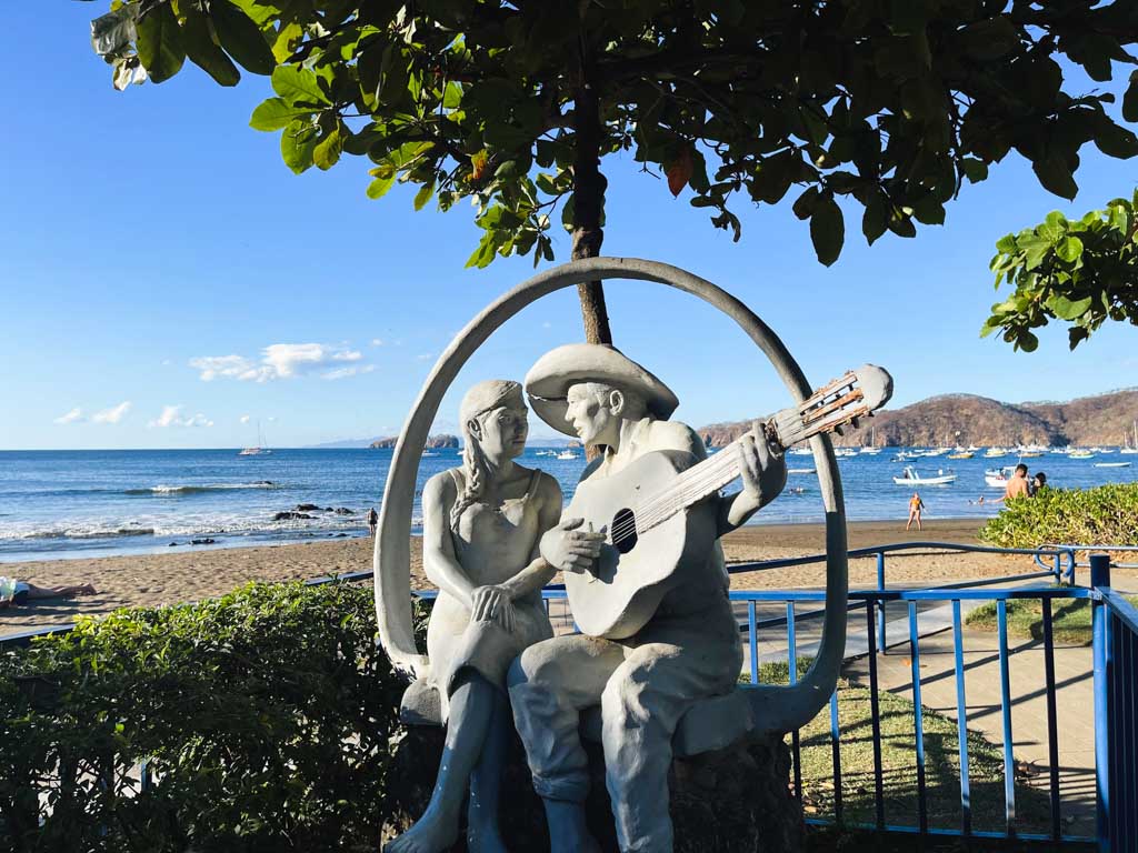 A sculpture of a couple, by the beach at Playa del Coco in Costa Rica.
