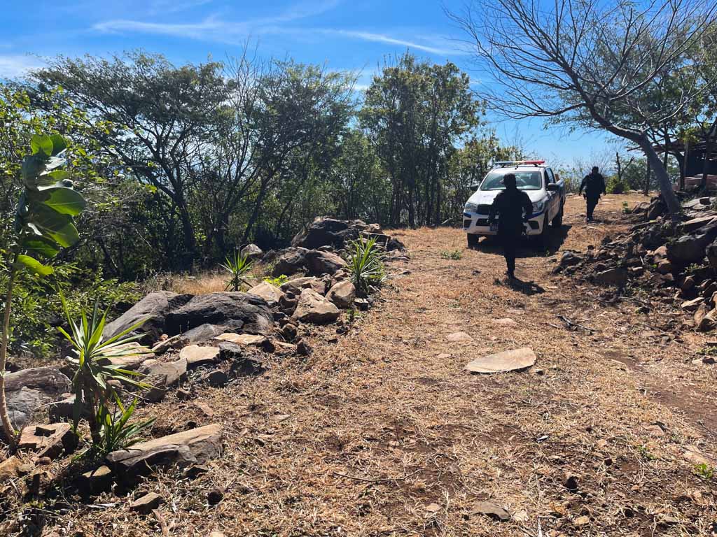 El Salvador police, taking part in the drone search mission at the forest of Conchagua.