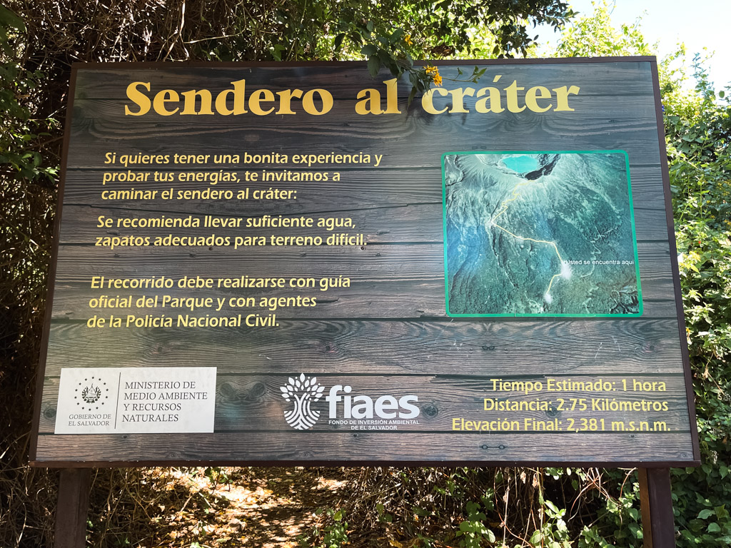 A signboard with instructions to follow for hiking on the Crater Trail.