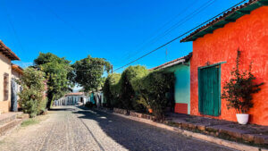 Colorful neighborhood and cobblestone street of Suchitoto in El Salvador.