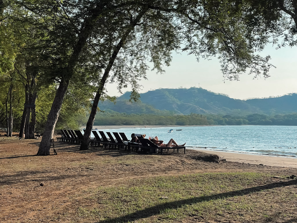 The serene setting of beach chairs lounge area of El Mangroove Papagayo, next to Panama Beach.