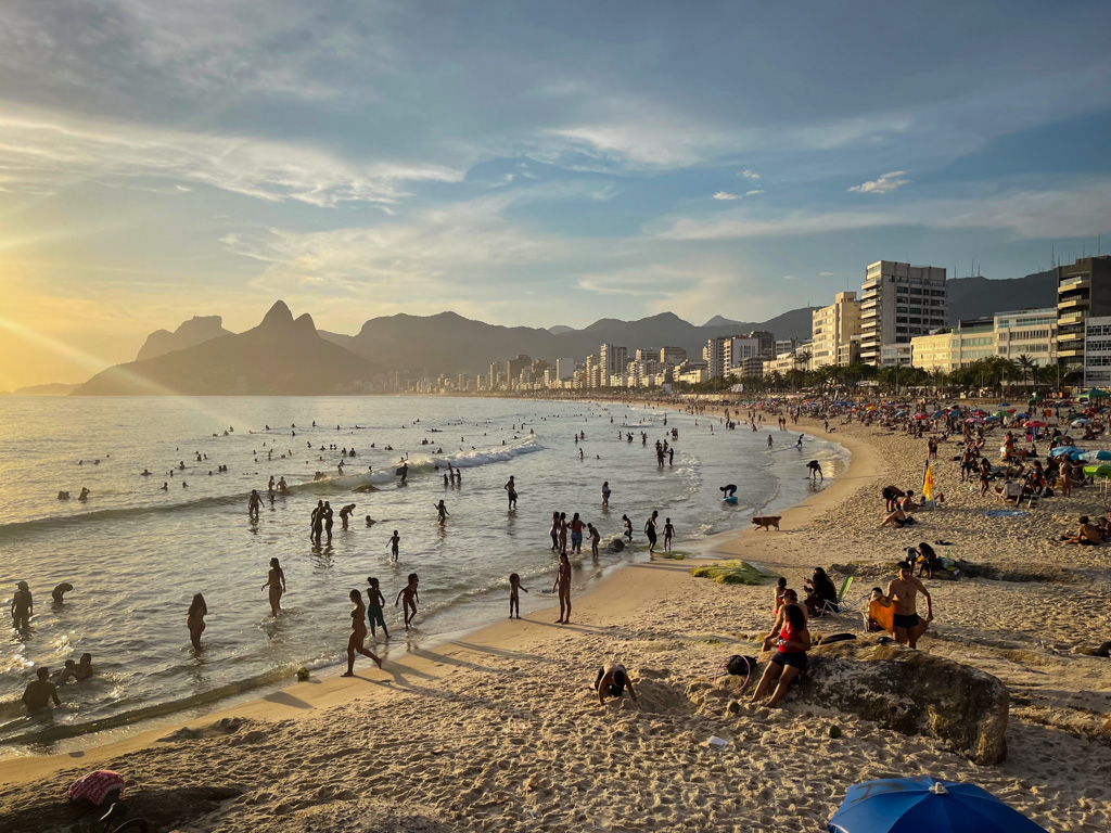 Sunset hour view of the sandy stretch between Ipanema and Aparador, one of the best areas to stay in Rio de Janeiro.