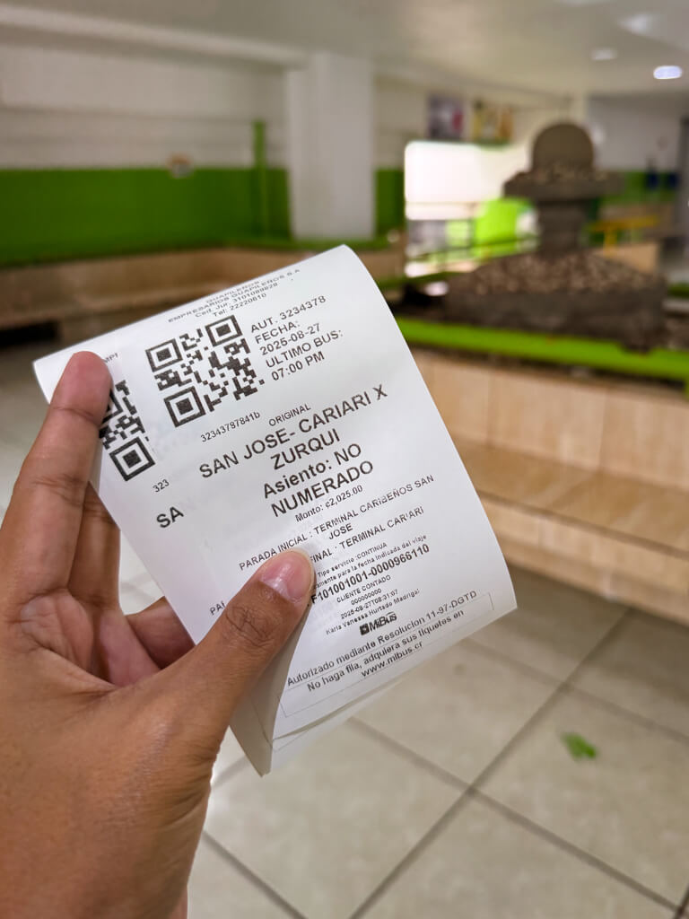 San Jose to Cariari bus tickets purchased at the terminal counter.