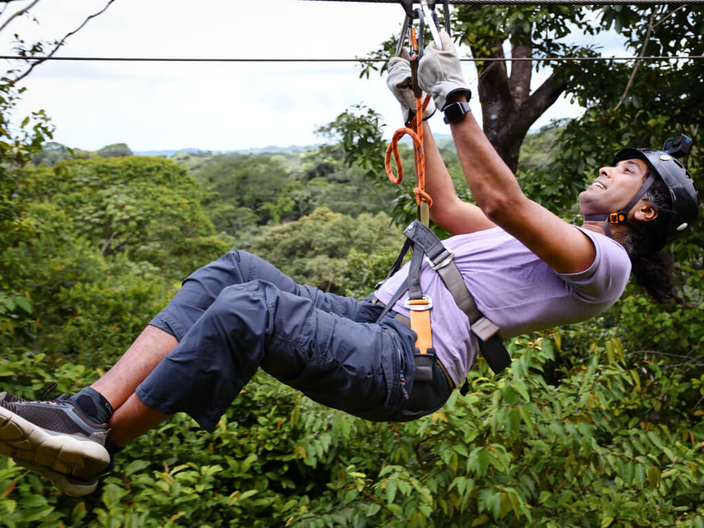 A man ziplining in Manuel Antonio.