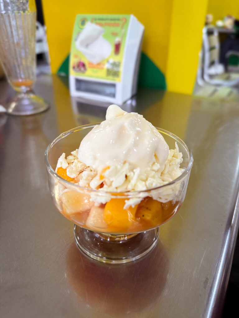 Salpicon, tropical fruit salad with cheese and ice-cream.