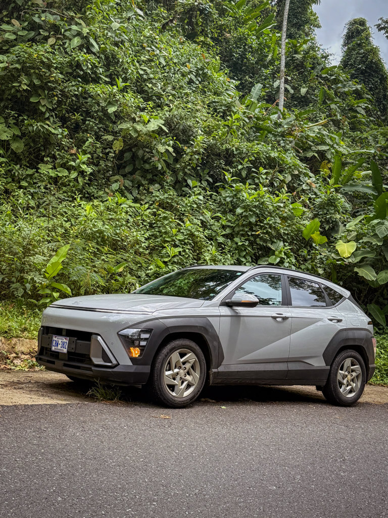 A rented car parked by the road in Costa Rica. Our recommendation is to rent a car with good ground clearance , if not a 4x4 rental car in Costa Rica.