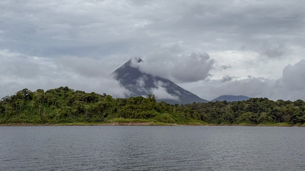 Arenal Volcano and Arenal Lake - sights of which can be enjoyed during a shuttle transfer from La Fortuna to Monteverde and vice-versa.