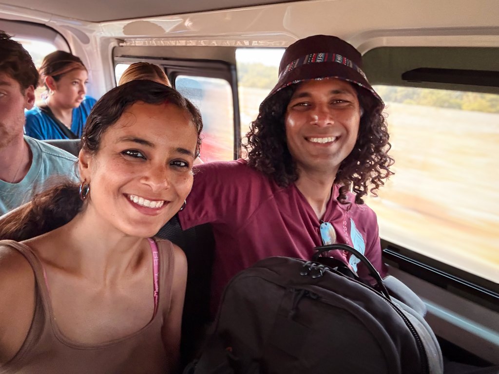 A woman and a man inside a shuttle from El Paredon to Antigua Guatemala.