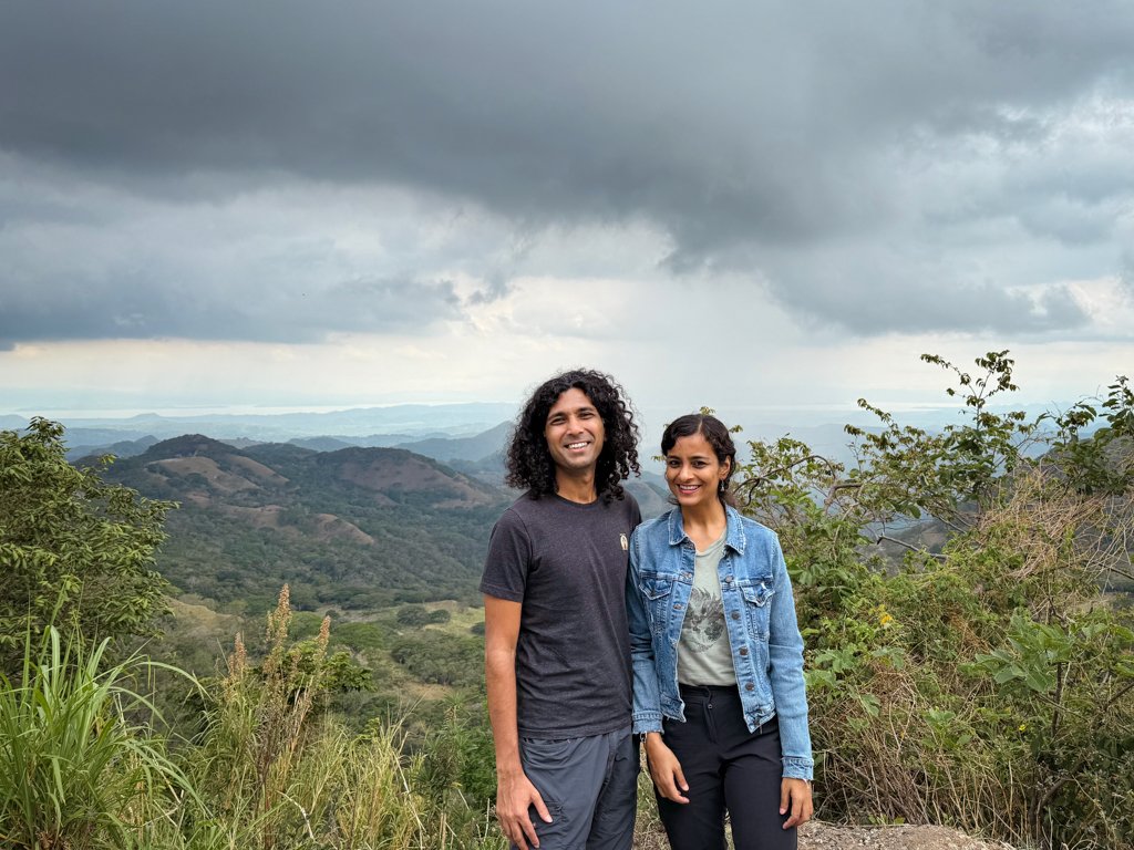 A man and a woman, at a viewpoint, on the way from Monteverde to Manuel Antonio.