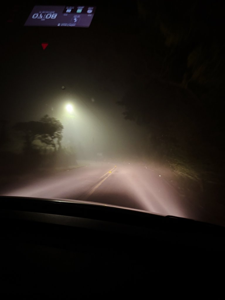 A street light after miles of driving in the dark! Nighttime driving in Costa Rica.